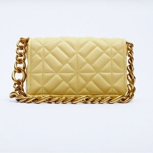 Quilted shoulder bag with chain .Never used